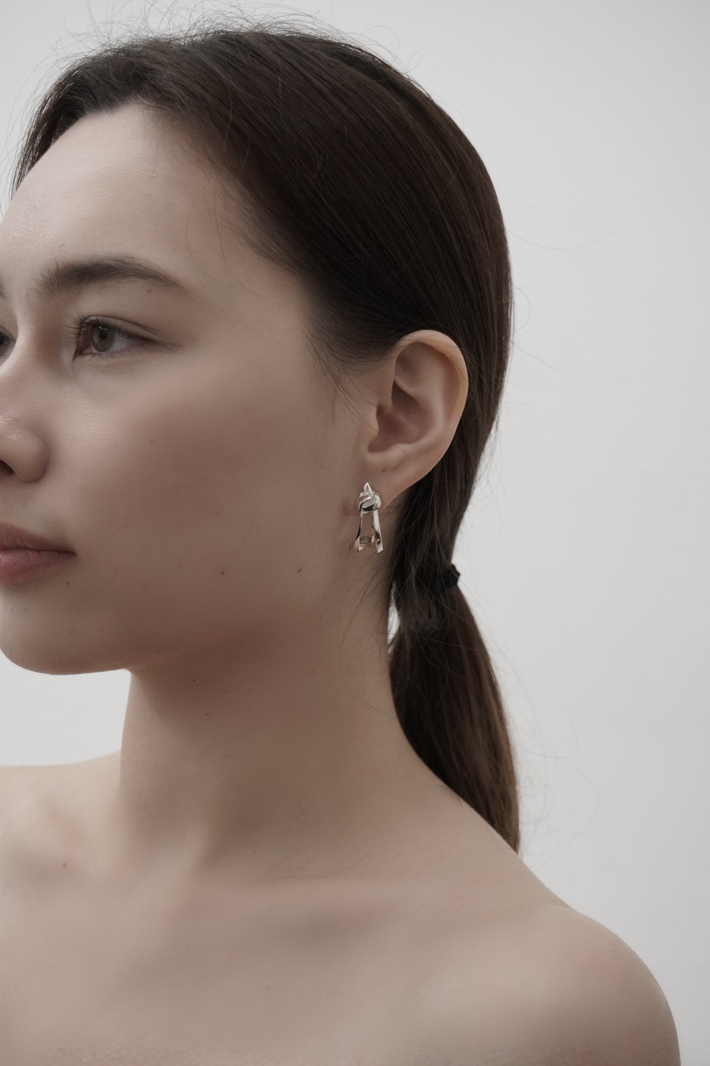 KNOTTED EARRINGS in Silver