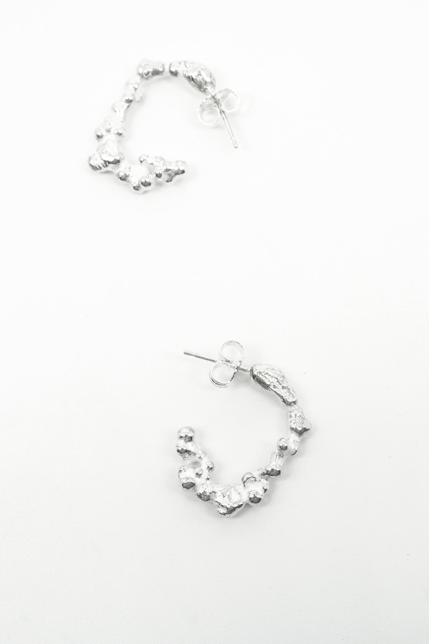 MELTED 1.0 LOOP EARRINGS in Silver